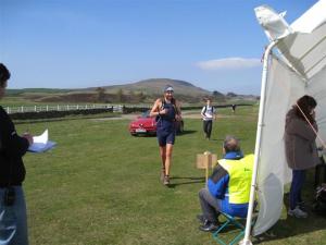 Early runners arriving at the halfway refreshment tent on Long Walk